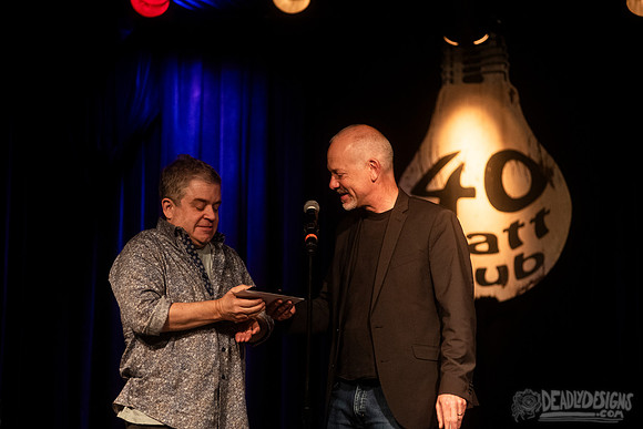 Mayor Kelly Girtz presents Patton Oswalt with key to city