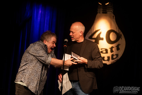Mayor Kelly Girtz presents Patton Oswalt with key to city