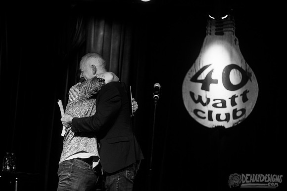 Mayor Kelly Girtz presents Patton Oswalt with key to city