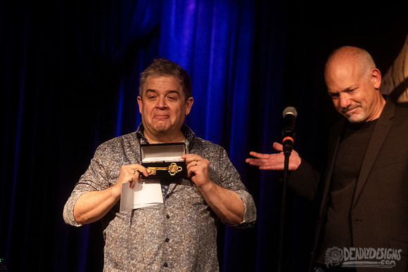 Mayor Kelly Girtz presents Patton Oswalt with key to city