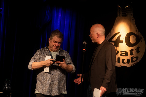 Mayor Kelly Girtz presents Patton Oswalt with key to city