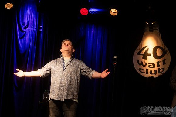Mayor Kelly Girtz presents Patton Oswalt with key to city