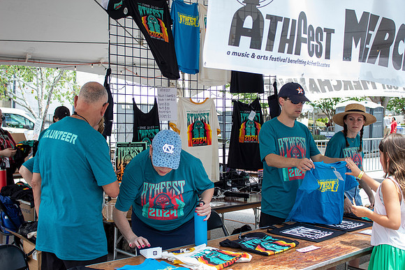 Merchandise & Volunteers (by Abigail Cantlay)