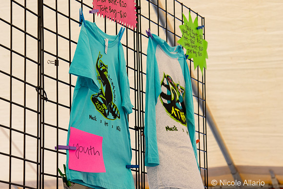 Merchandise & Volunteers (Nicole Allario)