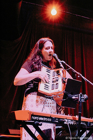 Del Roscoe (Nicole Rae Minish)